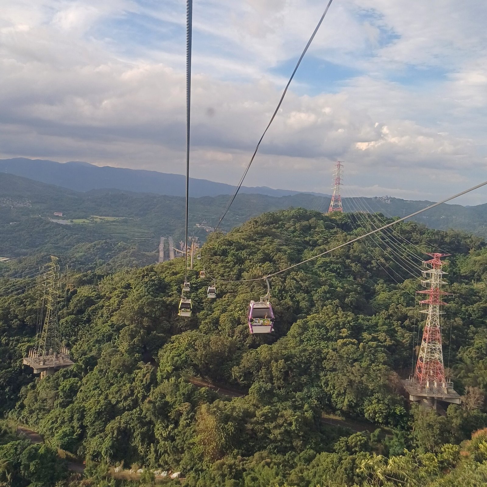 Keziah Candelario riding a gondola up Maokong Village in Taiwan
