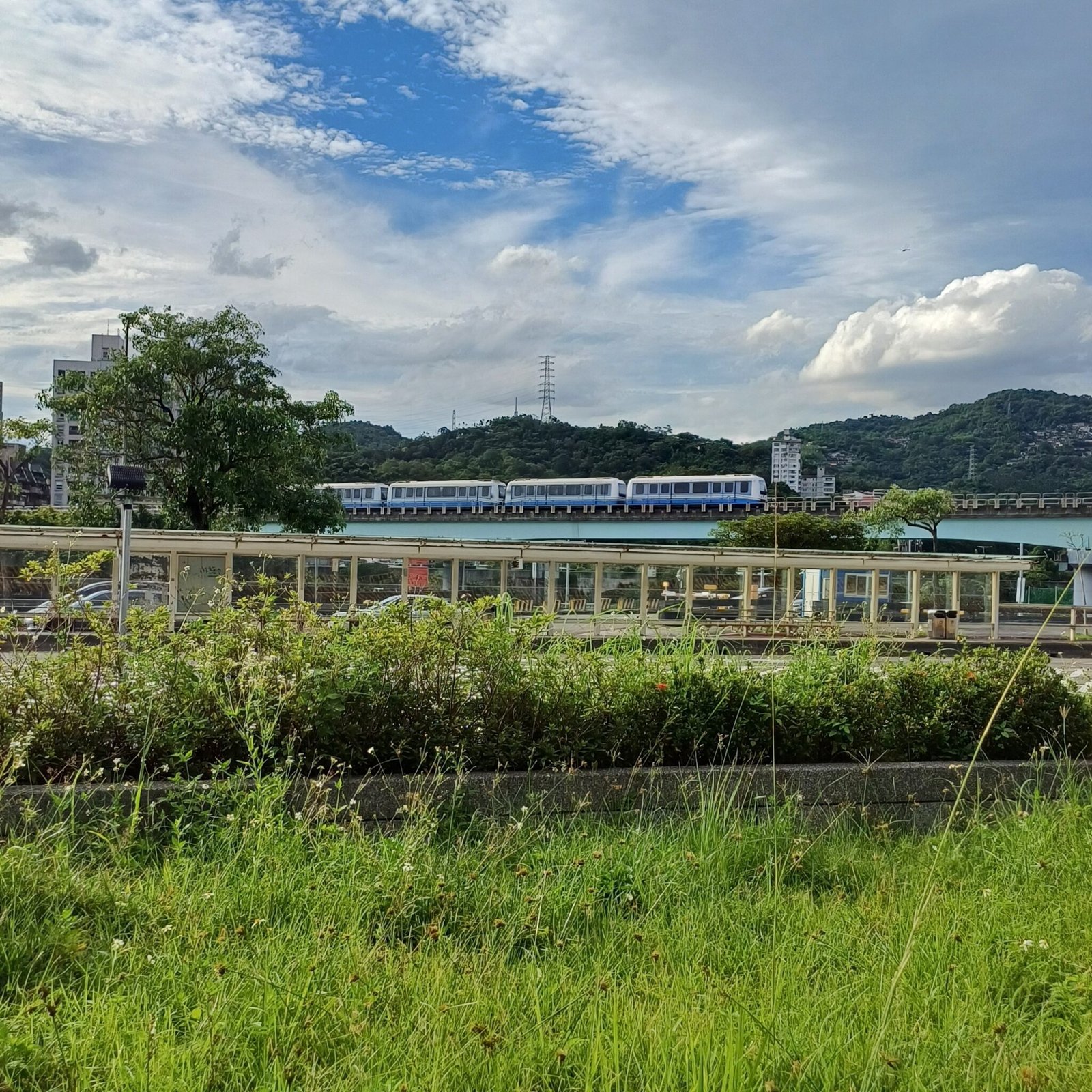 Keziah Candelario takes a photo of a moving train in Taipei